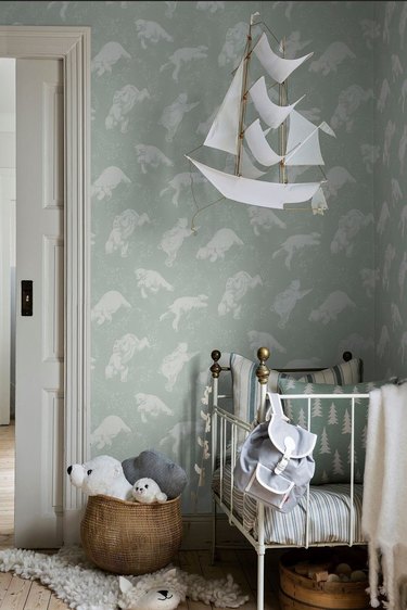 light green kids bedroom idea with polar bear printed wallpaper in Scandinavian kids room