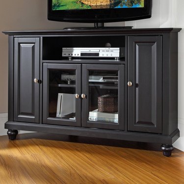 black corner TV stand with four doors