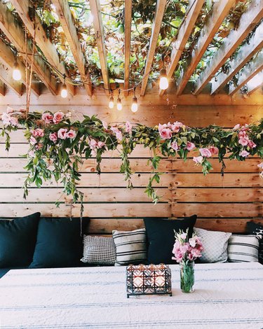 outdoor dining space with hanging florals