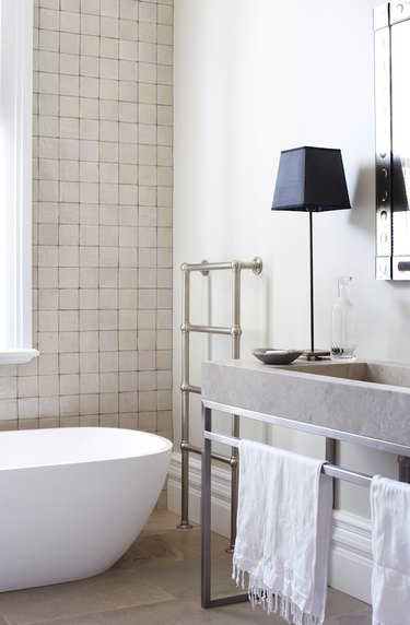 bathroom with concrete countertop