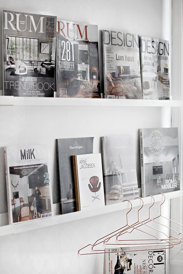 magazines displayed on picture ledges