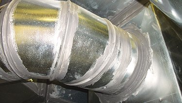 Duct sealed with mastic.