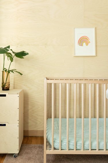 Plywood walls in the nursery.