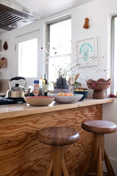 Wood kitchen bar counter with wood stools