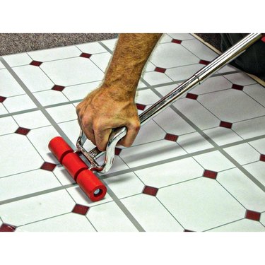 flooring roller on vinyl tile
