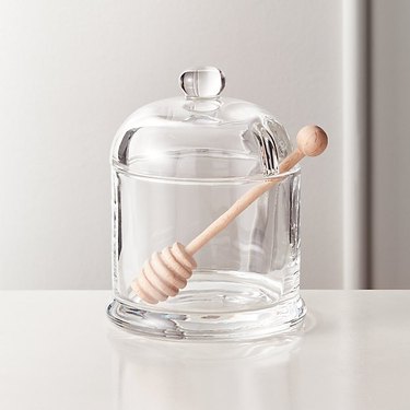 glass honey pot with stirrer