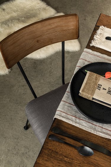 Rustic chic table and chair on concrete floor