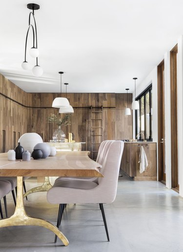modern kitchen with floor-to-ceiling dark wood cabinets