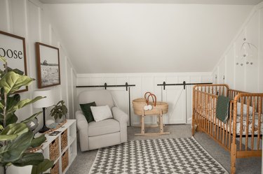 Vintage-inspired nursery idea with wooden crib and small barn-style doors