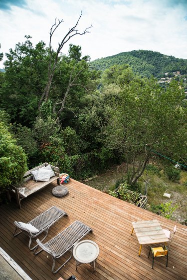 View of trees on hill from patio