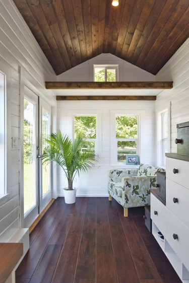 A-frame wood ceiling with matching dark wood flooring