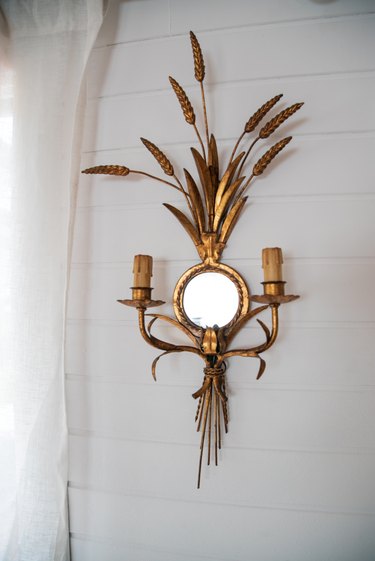 Brace, ornamental sconce with mirror