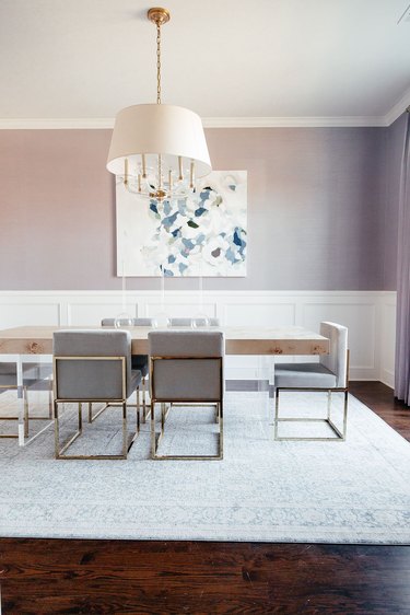 feminine dining room with dark wood flooring