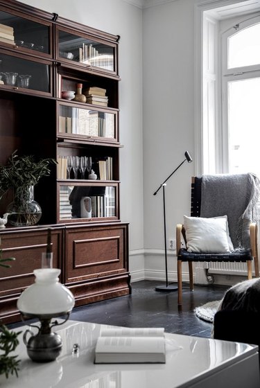 living room with black wood flooring