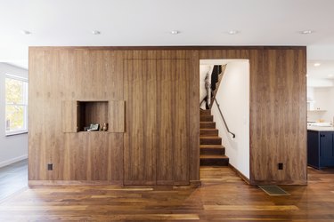 entryway with walnut built ins