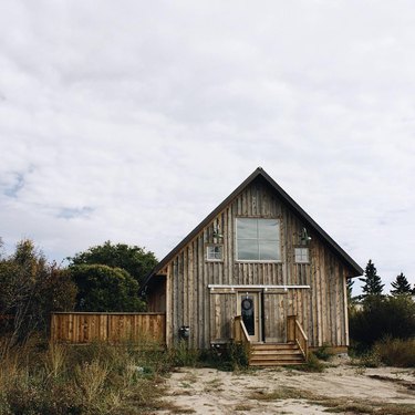 An a-frame wood farmhouse