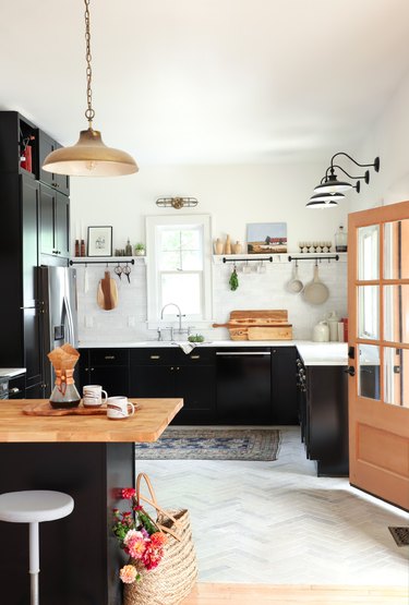 modern kitchen with black wood cabinets