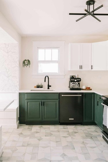 kitchen with green cabinets and ceramic floor tile