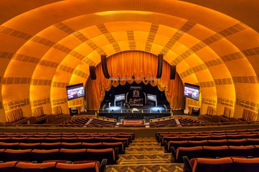 interior of Radio City Music Hall with seats and stage