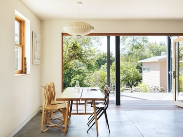 minimal dining room with vintage furnishings