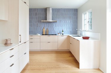 kitchen with blue backsplash