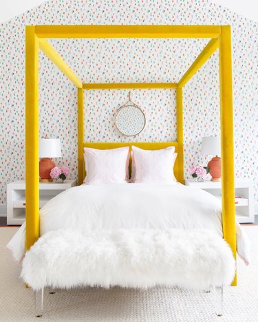 yellow four poster bed