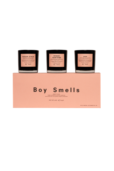 boy smells candle trio
