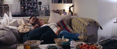 peter and juliet on the couch, still frame from love actually