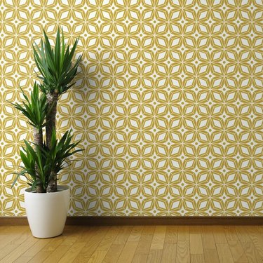 Yellow and white midcentury modern wallpaper with star shapes