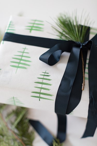 Wrapped gift with blue ribbon.