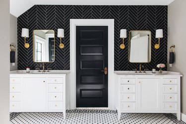 Black bathroom backsplash idea with herringbone tile