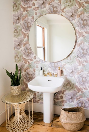 A patch of wallpaper turns a blah bathroom into something special.