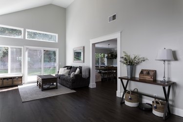 living room with vaulted ceilings and hardwood floors