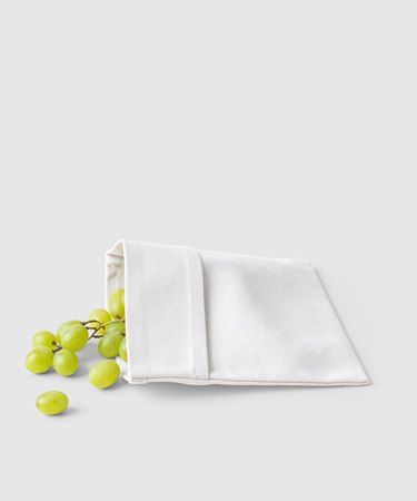 white snack bag with green grapes