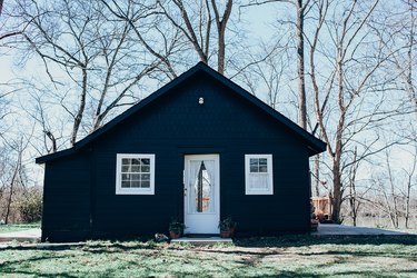 house with navy blue paint and white trim