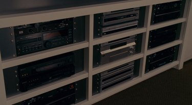 tv storage filled with media players, still image from the holiday