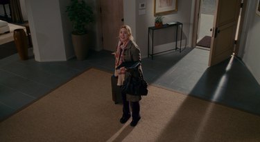 kate winslet standing in mansion entryway, still image from the holiday