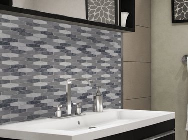 Gray and white peel and stick tiles in modern bathroom