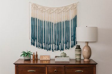 Add an extra dose of personality to this ready-made macrame wall hanging with natural dye.