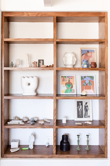 shelves with artwork and ceramics