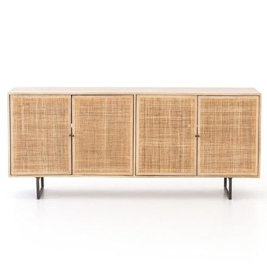 Blonde wood mid-century media console with four doors