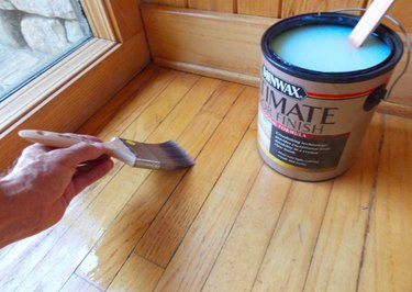 Floor varnish being applied.