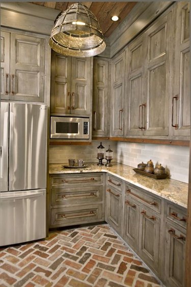 rustic kitchen with distressed cabinets