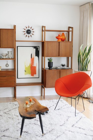 Orange and white midcentury modern colors in den