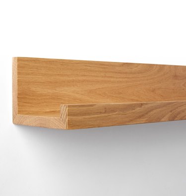 Wooden photo ledge shelf in medium finish