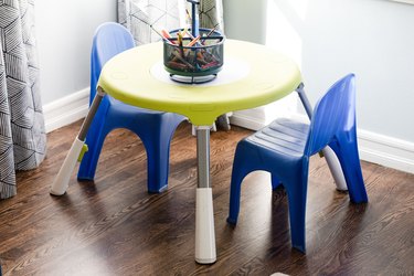 child's table and chairs on hardwood floor