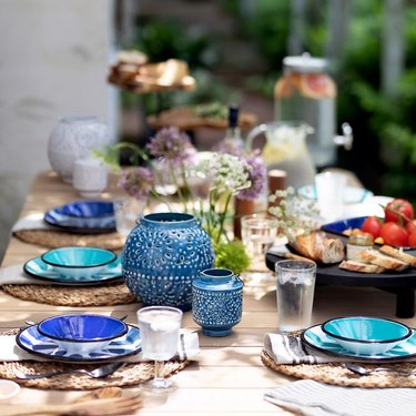 outdoor party idea with colorful dishware and decor