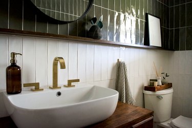 White tile bathroom Backsplash with olive tile