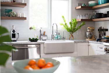 Kitchen with farmhouse sink and marble counter