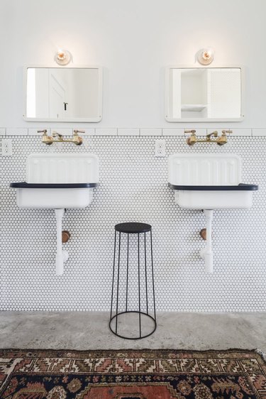 Utilitarian modern farmhouse bathroom idea with vintage sinks